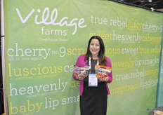 "Helen Aquino from Village Farms promoting the "Love Handles", bags of snacking tomatoes with a handle."
