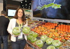 Nancy Pickersgill from Sunset holds two varieties of lettuce: Frisée and Boston.
