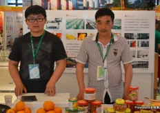 Zhang Jun and Wang Shui Lin represent Tianzi Shares, a large citrus producer.