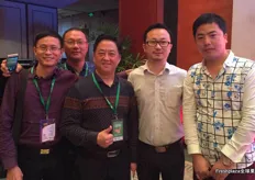 Starting from the right: Liu Jing Le, Oriental persimmon grower, Zender, representing iFresh and Simon Yang of Qingdao Sinagro Import & Export.