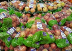 Packagings for apples varies from these bags of one kilogram to small punnets with just four apples.