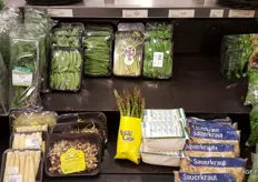 Baby corn and shoots are also on the shelves in this supermarket.