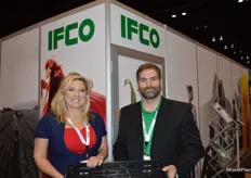 Hillary Femal and Paul Pederson with IFCO Systems US show an example of the company's crates.