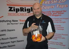 Chris Romito with Compac, showing the company’s zip bag