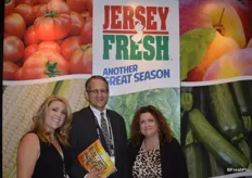 Brenda Flaim and Cindy Flaim from R&R Flaim with Eric Nieman from Produce Business in the middle