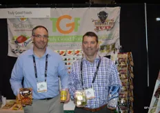 Chad Hartman and Mike DeCramer with Truly Good Foods showing some healthy snacks.