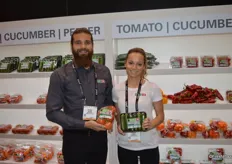 Mitch Amicone and Kat Tomoski with Amco Produce. Mitch proudly shows the company’s newest product: organic tomatoes on the vine.