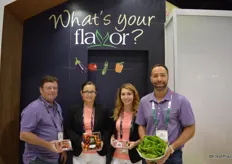 Proudly showing different tomato products as well as lettuce are Alan Asbury, Marina Davidson, Kiley Gray and Ken Paglione with Pure Flavor.