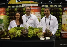 Many different lettuce varieties on display at the Hollandia Produce booth. From left to right: Amber Rappozo, Brian Cook and Baltazar Garcia.