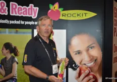 Jay Dyer from Borton Fruit showing the Rockit apple. Borton Fruit and Chelan Fresh had a shared booth to promote its Rockit apples.