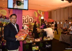 Sigfrido Molina, at his stand promoting Ready to Eat mangoes, avocados and aromatic herbs.