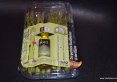 Individual packs of asparagus and olive oil.