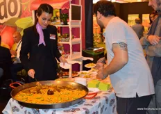 Tasting of paella with avocados.