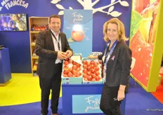 "Marc Peyres and Dina Abella from Blue Whale with the "best of the best" variety Fuji."