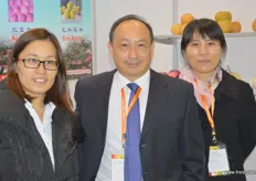 David Wang, the president of Jinan Haoyuan Agricultural Products from Jinan in Shandong provice, together with Clara Wang to his right and Zhao Junmei to his left. The company grows pear, apple and citrus.