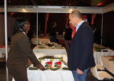 Isabel Onyango-Ong'ara from Celtic Investments is explaining something about here products. This is a company based in Kenya and selling different kind of vegetables like beans, sugar snaps and others. They also export fruits and flowers.