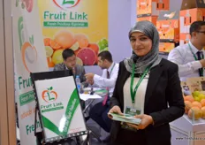 Mrs Asmaa Osman welcomes guests at the booth of Fruit Link, Egyptian citrus exporter.