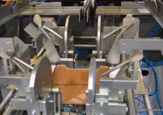 Boix carton box folding and stacking line: the boxes are folded and glued for strenght.