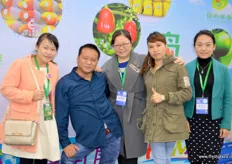 Cheerfull delegation from Hainan, with, second from left, Mei Hua Ping of iFresh.