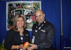 Mary Velaszquez and John Castellanos with Coast Tropical, showing one of the company's many tropical fruit items.