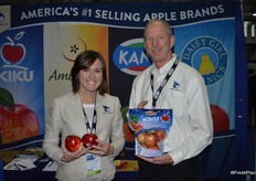 Katharine Grove and Tim Welsh with CMI Orchards. Katharine shows jumbo size apples. Sizes 48, 56 and larger are plentiful this year and allow for good promotions.