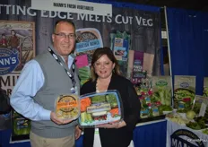 Daniel Welk and Lorri Koster with Mann Packing, showing Nourish Bowls and a holiday vegetable tray.