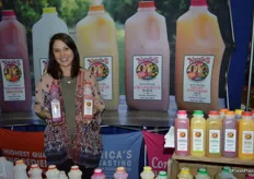 Natalie Sexton with Natalie's Orchid Island Juice Company, offering juice to all trade show attendees.
