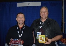 Barry Botelho with Ocean Spray, showing cranberries and Justin Ruta with Oppy, showing Sungold kiwis.