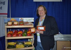 Brett Burdsal with SunFed shows organic grape tomatoes and SoHo Sweets. SoHo Sweets have a higher brix level and will be available in stores in a few weeks.