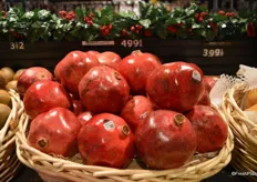 Pomegranates at $4.99 each.