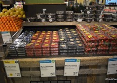 Blueberries priced at 3 clamshells for $10. Raspberries and blackberries are $3.99 per clam shell and strawberries are $5.99.