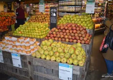 Selection of pears, grown locally in Connecticut as well as Washington and Oregon. The signage in the middle of the display explains customers how to best store this product.