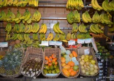 The other side of the display holds bananas as well, but also more exotic items like star fruit, dragon fruit, persimmons and yucca.
