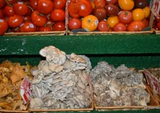 Specialty mushrooms and tomatoes.