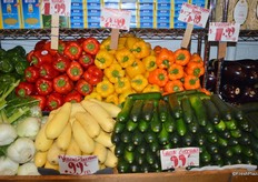Vegetable display including bell peppers from the Netherlands.