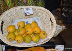 Golden papayas from Hawaii offered at $4.99 each.