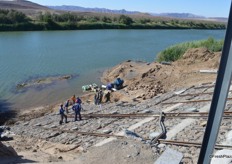 The new pump systen is on rails to move up and down with the river level.