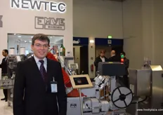 Frank Biesel- Engineer showing the Biesel packing machine at their stand.