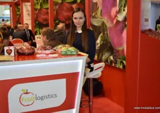 Kateryna Sergieieva from Fruit Logistics, showing visitors the different apple packaging they offer.
