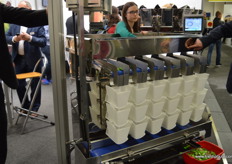 Eileen Baily demonstrates the multi-head weigher from Ishida.