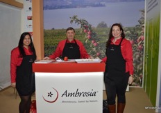 Sampling Ambrosia apples are Bunvir Nijjer, Brian Gilroy and Christine Gross.