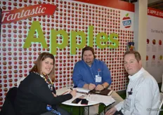 Marta Molla Insa visiting the booth of United Apples Sales with next to her Josh Tunstall and Brett Baker with United Apple Sales.