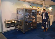Lourens van Keulen from Tramper Technology with the topseal machine for trays sold at the fair. This machine will be supplied to a Finnish vegetable processing company.