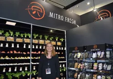 Laura van Eijk from Mitrofresh in front of the Wall of Fame. A nice presentation of mushrooms and Asian leafy vegetables.