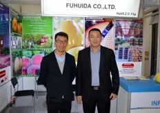 Eric Guo, left, is the Operations Assistant at Fuhuida, an importer and exporter of fruits. He is together with Wang Zhi Peng.