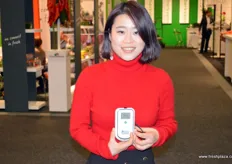 Tina Sun of Cydiance, with one of the company's data tracking devices.