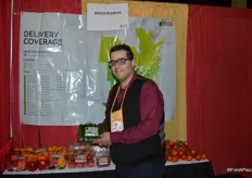 Mark Ricci with Amco Produce showing mini cucumbers