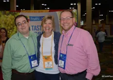 Mathew Tate and Chris Schilling with Aramark are visiting with Karen Brux from Fruits from Chile.