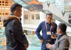 Networking during the break. To the left is Levin Flake, of the Guangzhou U.S. Agriculture Trade Office.