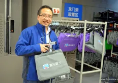 Paul (Yu Xianping) is the Marketing Manager of Hema. The bags can be used to collect fresh produce that have been ordered by clients online. All deliveries are done within 30 minutes after ordering within a certain area around each store.